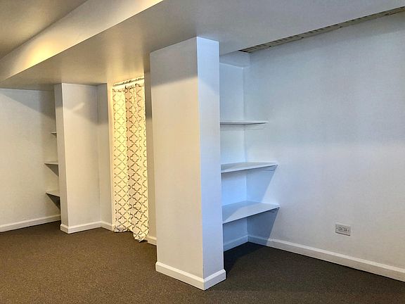 primary bedroom looking at shelving
