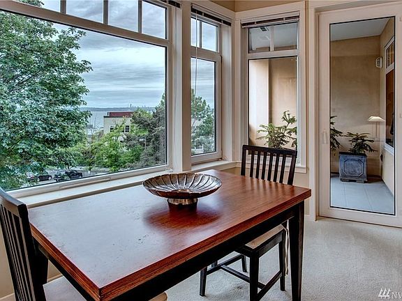 Views of Seattle skyline from living room window and covered