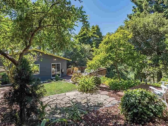 Two treetop decks overlooking creek