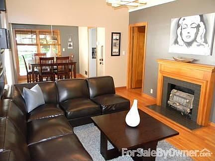 1st floor living room : Open to the dining room with gas fireplace and 10 foot ceiling.