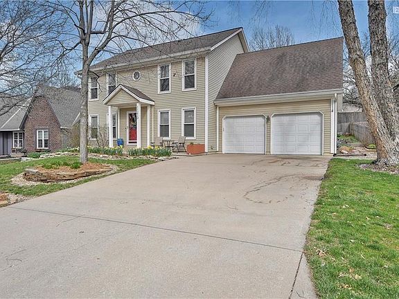 Two car garage has insulated overhead doors. Inside garage you will find Gladiator metal cabinets and counters.