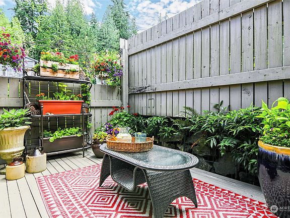 The newly replaced front patio is perfect for entertaining guests or unwinding after a long day.>