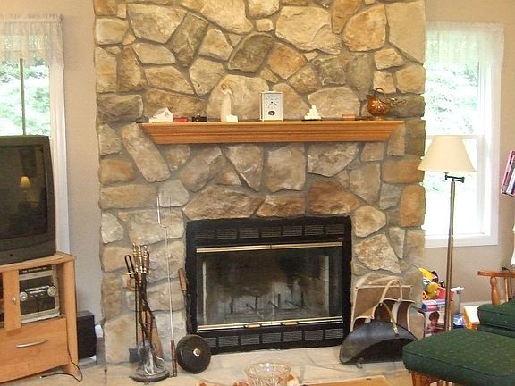 Beautiful fireplace with gas starter.