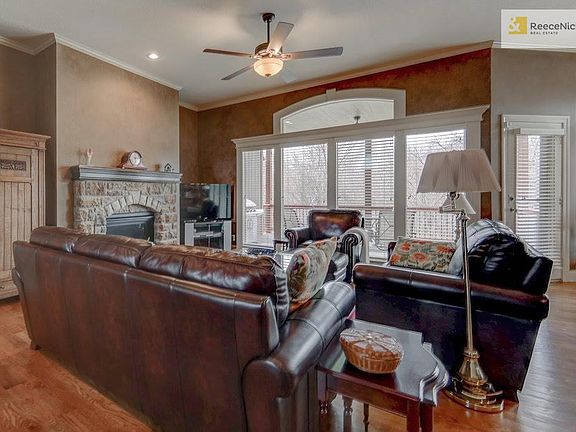 Wall of windows in great room w/beautiful views of wild life and trees.
