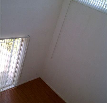 2nd image of 18600 Collins St APT 210
