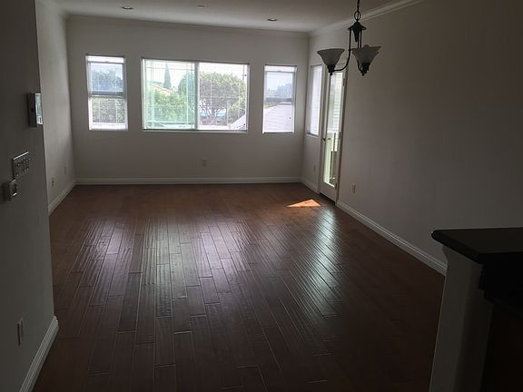 Apt. 202 living room and dining room plus door to balcony