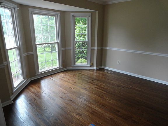 Large dining room with lots of light.