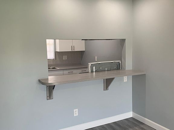 Bar counter top looking into kitchen