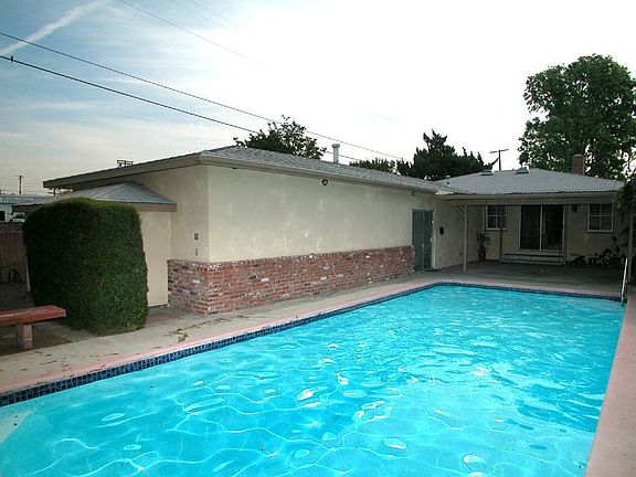 Large yard with foom behind garage for grassy yard