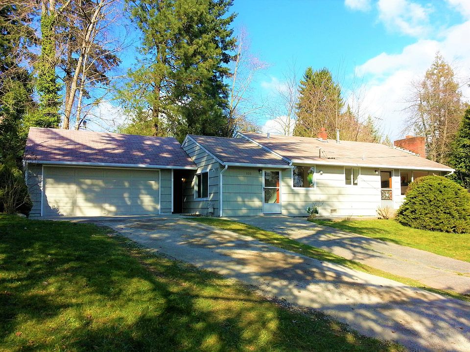 1-story rambler with oversized 2 car garage attached with breezeway. Spacious lot with private backyard.