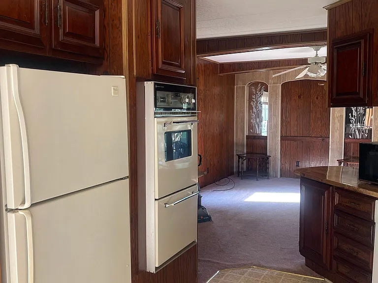 view of kitchen going into living room