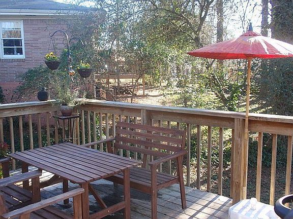Nice deck with good natural light and shade trees