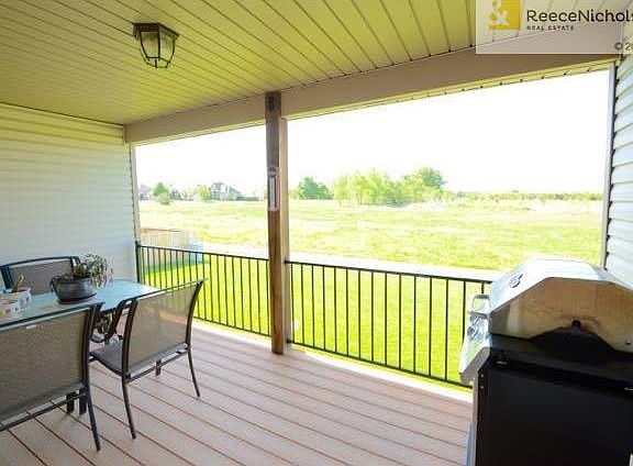 Fantastic covered porch for morning coffee or BBQ dinner!