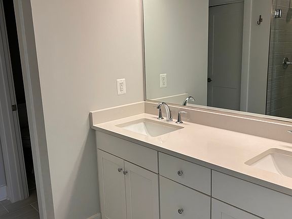 Primary bathroom with private water closet.