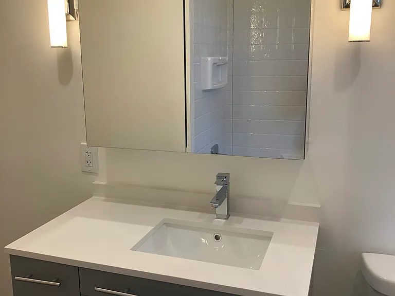Bathroom sink and Vanity mirror with medicine cabinet