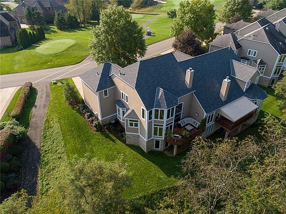 The Architecture is stunning with a mixture of brick and Hardi Plank cement siding, soft grey 30 year dimensional shingles, all 