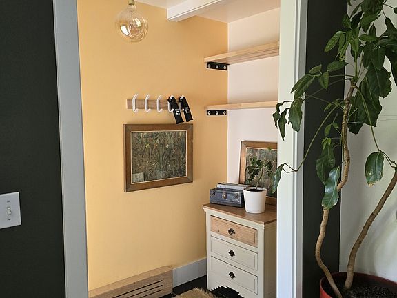 Front entrance with hooks and shelving for all of your outdoor gear.