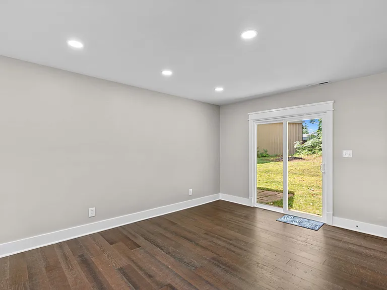 Dining area with sliding doors that lead out to covered back porch.