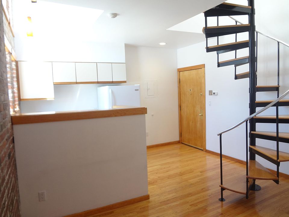 Living Room to Kitchen and front door