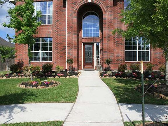 This beautiful wooden door greets you to this beautiful dwelling!