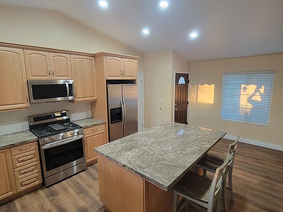 Custom Kitchen. Vaulted Ceilings. Recessed Lighting.