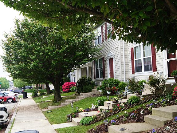Side view of property-end of Cherry Tree is the community pool which is included in HOA fee paid by owner