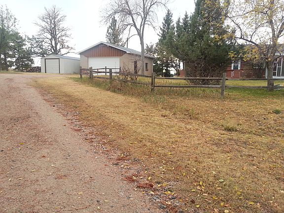 Detached garage and shed