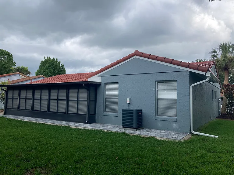 Backyard. View of rear master bedroom and Florida room