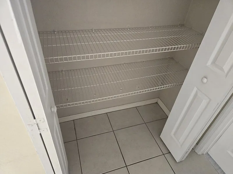 This is a great 2 bedroom with tile and a nice 2 backyard close to many shopping centers areas — Photo 2