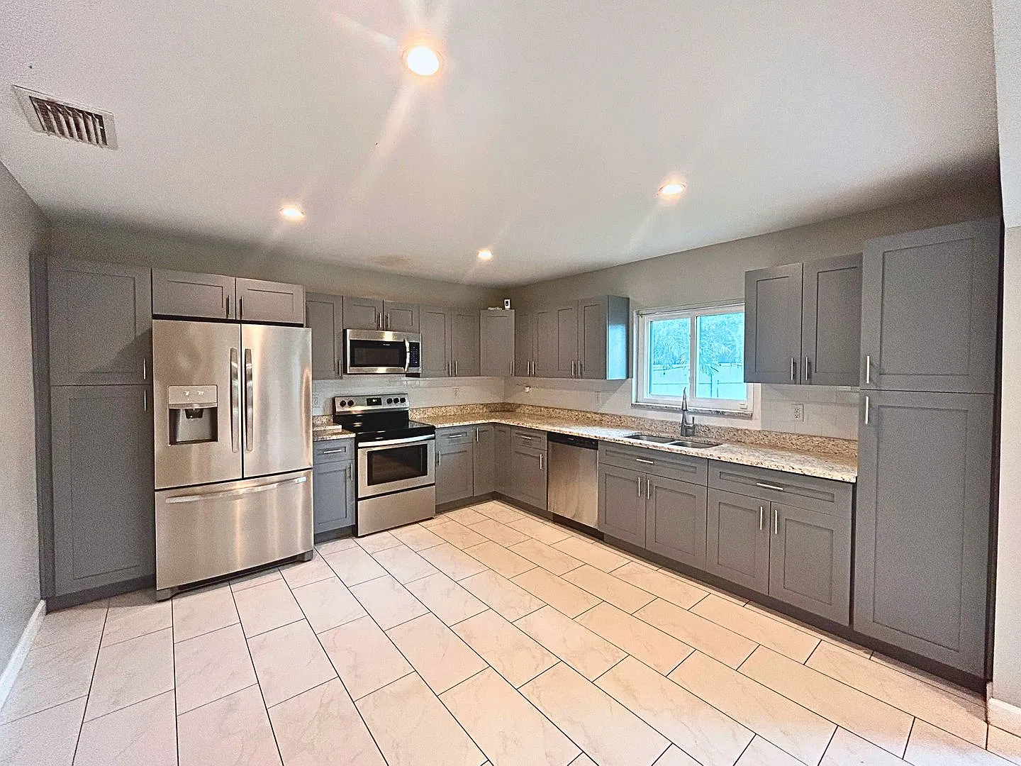 Renovated Home with Open Layout and Prime Location! — Photo 4