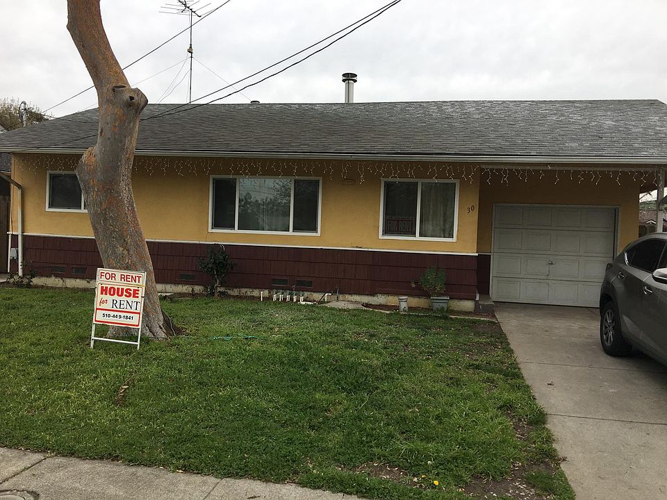 Huge Front and Back Yard, with Garage and Drive way parking.
