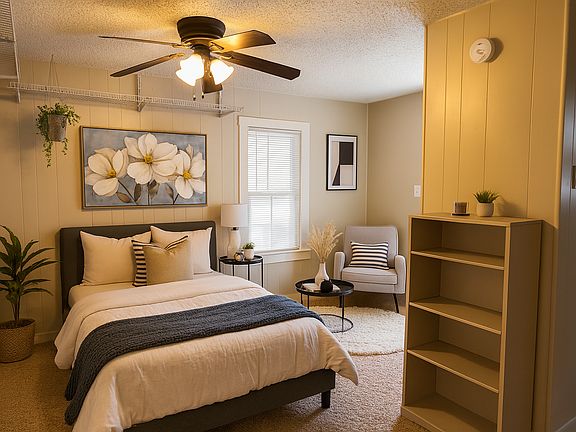 Perfect studio home with room for bed, small sofa, study desk. Furniture is staged