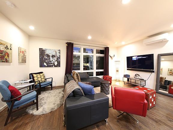 modern and hip furnishings, 60" tv.