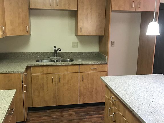 Kitchen with custom cabinetry and center island