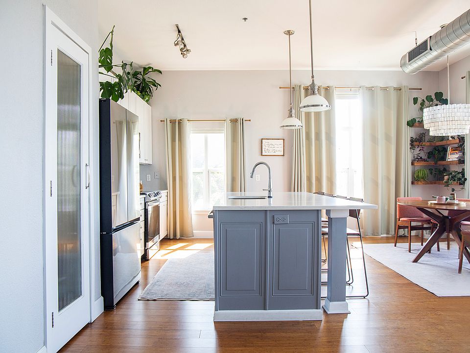 Modern kitchen with new appliances and finishes.