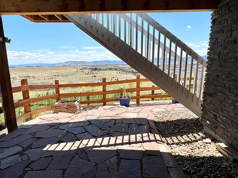 Fenced-in backyard from walk-out basement doors