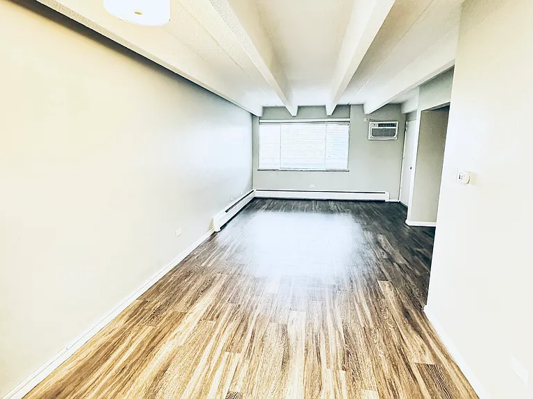 Step into this sleek apartment with contemporary wood flooring and ample lighting. Step into this sleek apartment with contemporary wood flooring and ample lighting.