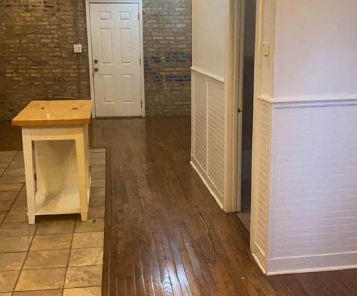 View from kitchen towards rear entrance door.
