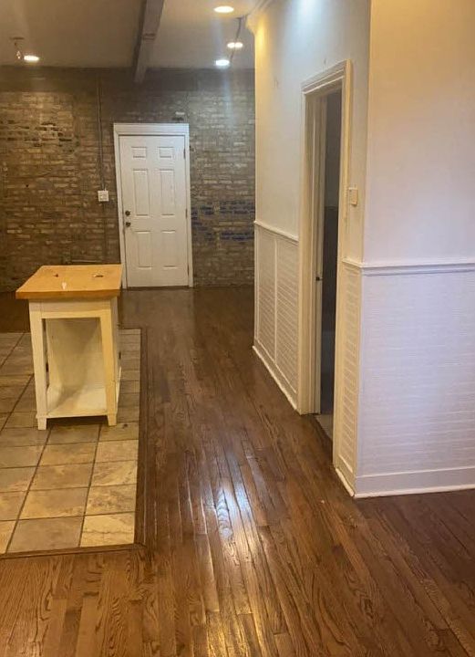 View from kitchen towards rear entrance door.