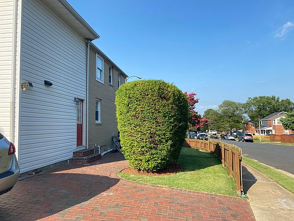 Exterior, driveway, door into Kitchen