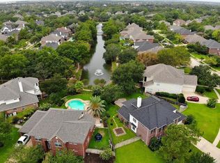 15715 Lake Loop Dr, Cypress, TX 77433