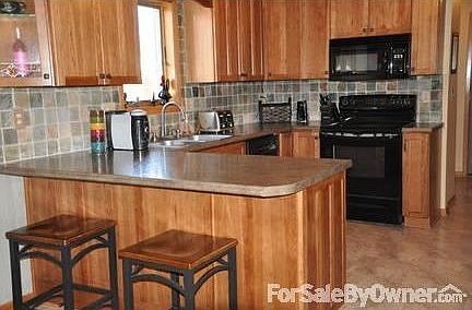 Beautiful $25,000 updated kitchen!
						:
						All new cupboards, counter tops, and tile