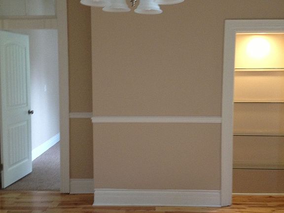 DR with lighted china shelve