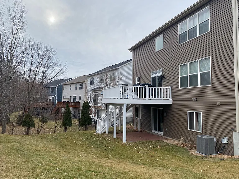 Rear of House. Maintenance free deck recently redone.