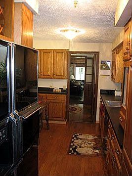 Kitchen with hardwood floors and oak cabinets