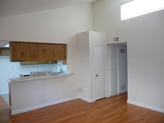 living room with cathedral ceiling