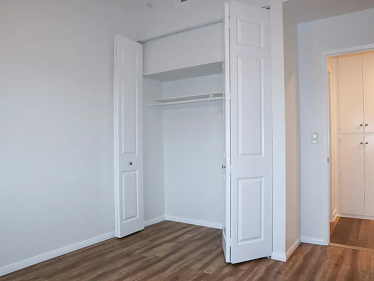 Bedroom #2 with vaulted ceilings.