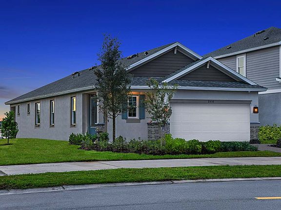 Cypress model farmhouse elevation new construction with optional stone at BridgeWater by William Rya