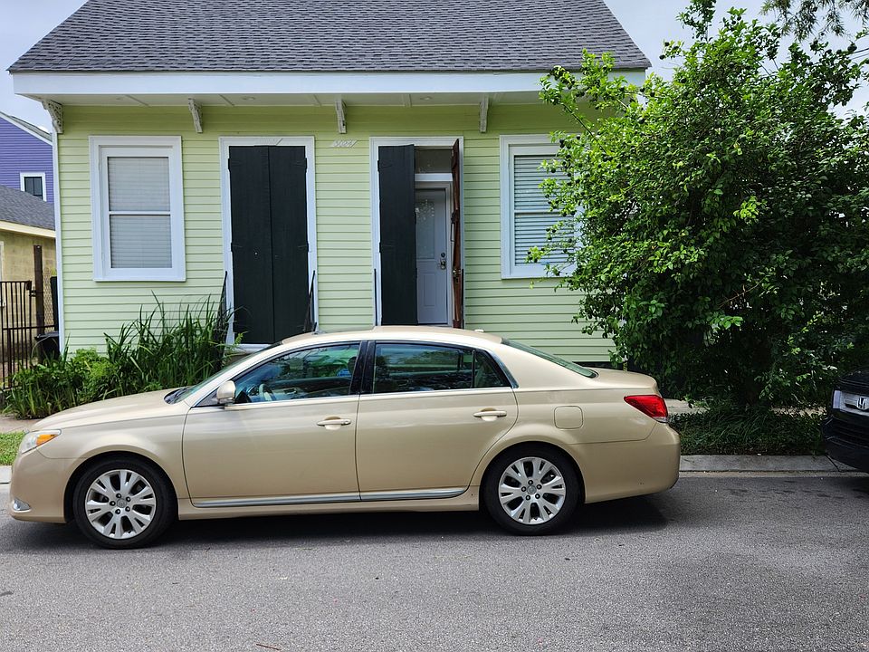 Street level curb view, showing outer entry door with keyless security inner door