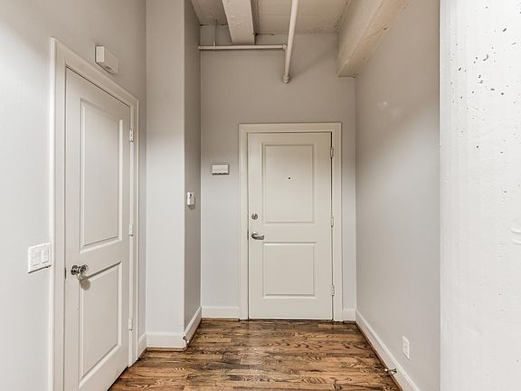 Entry hall with coat closet on the left.
